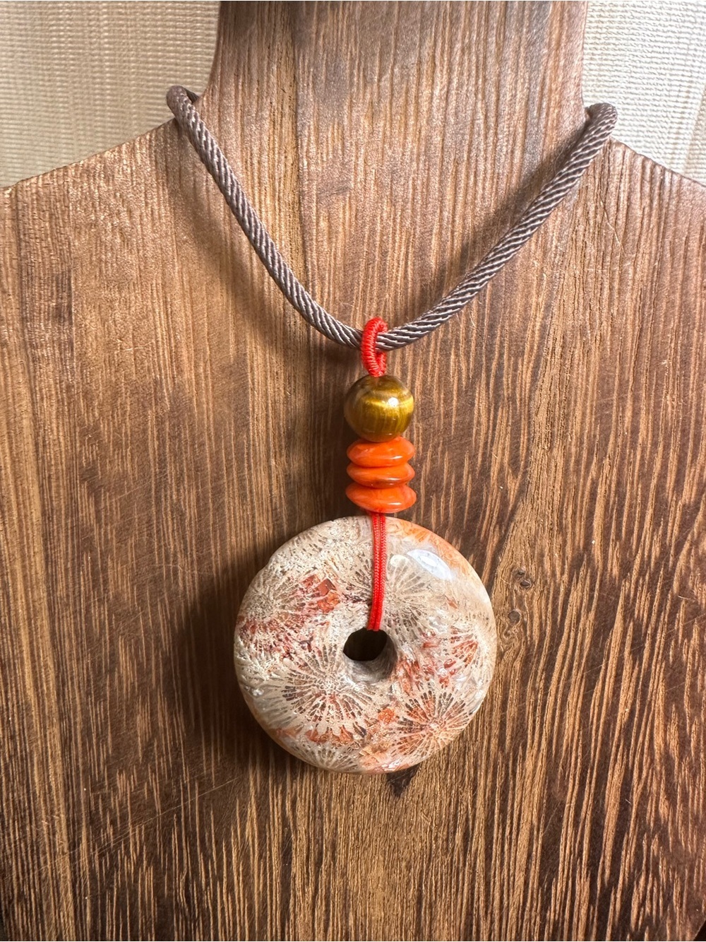 Handcrafted Red and Brown Coral Fossil Donut Pendant Necklace on Brown Rope